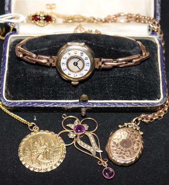 A ladys 9ct gold wrist watch and assorted jewellery including ring and pendant.